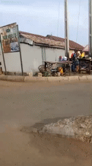 Morning street scenes documented across Jos, Nigeria business district