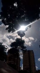 Witness documents routine street life in sunny Caracas
