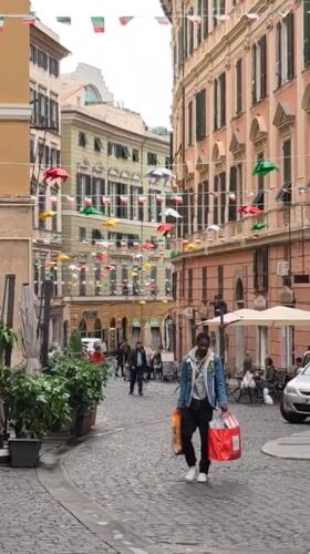 Morning street scenes captured in historic Genoa, Italy