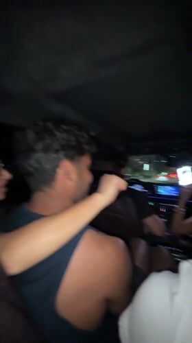 Four people travel together in car at night