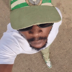 Man records outdoor selfie video while walking