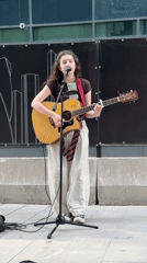 Acoustic street performance in Khimki, guitar and vocals outdoors