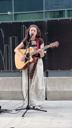 Acoustic street performance in Khimki, guitar and vocals outdoors
