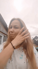 Summer day in rural Russia: roses, a black cat, outdoor portraits