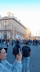Flag-carrying demonstrators march through central Barcelona streets