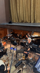 Theater performance and orchestra rehearsal captured by witnesses
