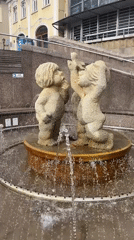 European city walking tour with fountains and architecture