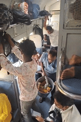 Crowded train compartment documented in Guntapalli, India