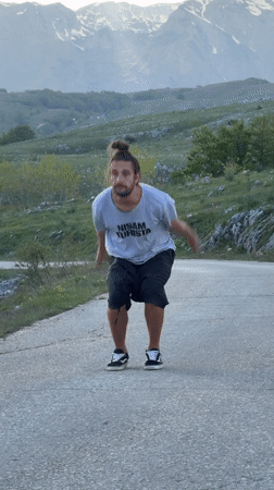 Man performs backflip on road in Montenegro village
