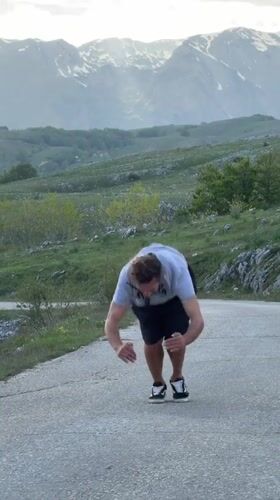 Man performs backflip on road in Montenegro village