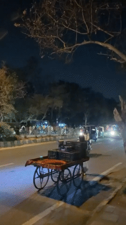Delhi streets at night: food stalls, transit, and local commerce
