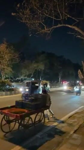 Delhi streets at night: food stalls, transit, and local commerce