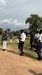 Youth marching band parades through Mararaba, Nigeria