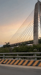 Cable-stayed bridge filmed during sunset in Đà Nẵng, Vietnam