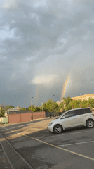 Double rainbow appears over Artyom, Russia parking area