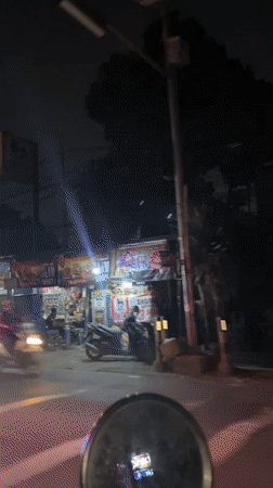 Nighttime street activity documented in Tangerang, Indonesia