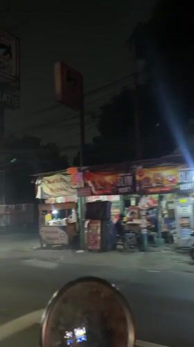 Nighttime street activity documented in Tangerang, Indonesia