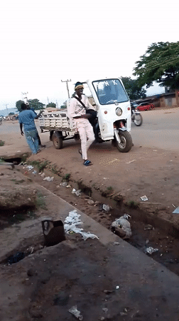 Street life and text graphics from Gboko, Nigeria