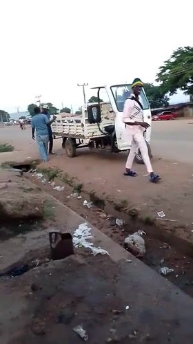 Street life and text graphics from Gboko, Nigeria