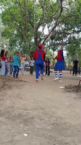 Community celebration with costumed entertainers draws crowds in Tinaquillo