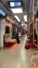Moscow subway car observed mostly empty during evening commute