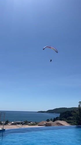 Purple parasailer spotted soaring above Montenegro waters