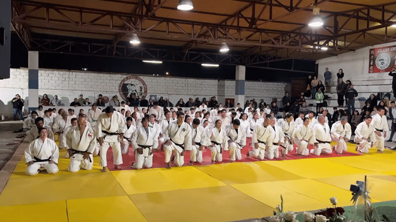 Formal judo ceremony on the mat in Arica, Chile