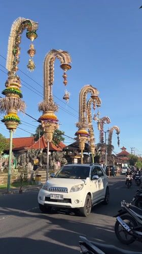Traditional Penjor festival decorations documented across Bali streets
