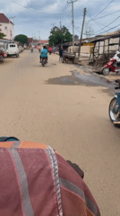 Market day in Keffi with fresh produce and motorcycle ride