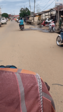 Market day in Keffi with fresh produce and motorcycle ride