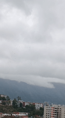 Overcast afternoon documented across Caracas residential neighborhoods