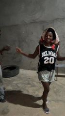 Community dance gathering captured in concrete spaces in Iperu