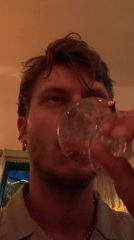 Man drinks wine in Tel Aviv evening