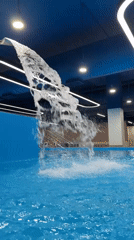 Indoor pool waterfall feature documented in Krasnoyarsk facility