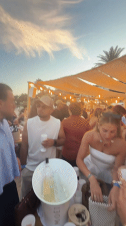 Outdoor sunset party gathering observed in Vallauris, France