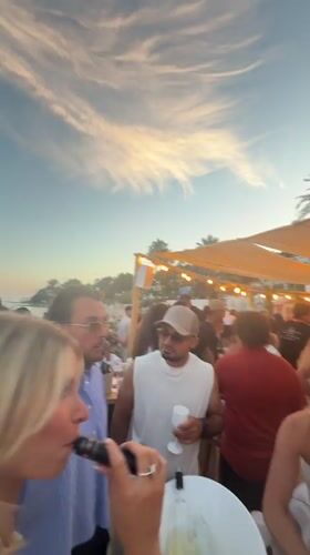 Outdoor sunset party gathering observed in Vallauris, France