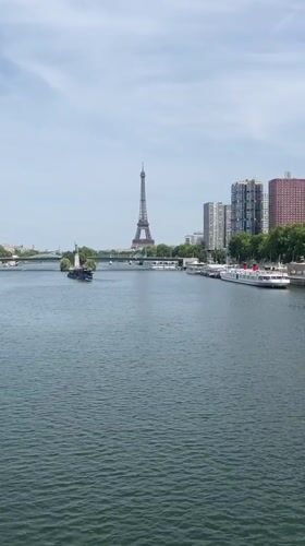 Boats on the Seine with the Eiffel Tower in view