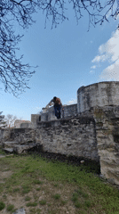 Man performs backflip off stone structure in Veliki Preslav