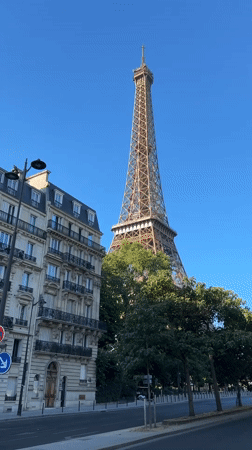 Daytime street-level view of the Eiffel Tower, Paris