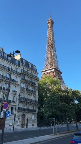Daytime street-level view of the Eiffel Tower, Paris
