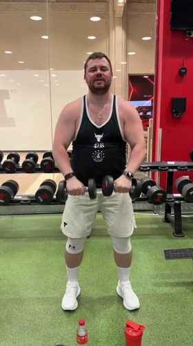 Strength training session at a Dubai gym, multiple exercises covered