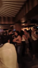 Evening crowd fills Delhi bar with dancing and socializing