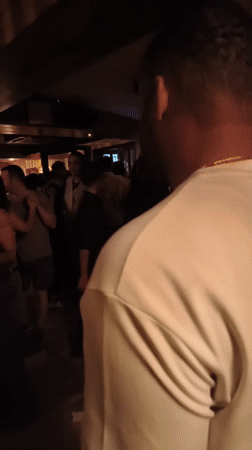 Evening crowd fills Delhi bar with dancing and socializing