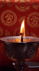 Buddhist monks perform ritual ceremony in monastery hall