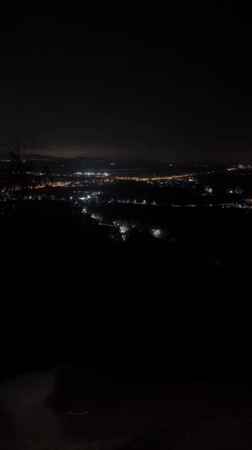 Night cityscape filmed from elevated position in Thailand