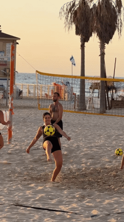 Beach volleyball and sunset gathering in Tel Aviv