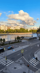 City riverfront at golden hour, intersection and embankment in view