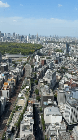 Dawn aerial views and rooftop activity observed in Shibuya