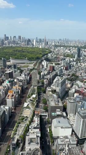 Dawn aerial views and rooftop activity observed in Shibuya