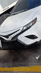 White Toyota Camry spotted parked beside truck in Juan Griego